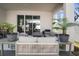 Covered patio with outdoor seating, perfect for relaxing and entertaining at 1088 Happy Forest Loop, Deland, FL 32720