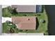 Well-maintained home with manicured lawn, landscaping, and serene water views, ready for move-in at 111 Brown Crane Ct, Daytona Beach, FL 32119