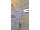 Bright bathroom with a single sink vanity and a shower-tub combo at 111 Brown Crane Ct, Daytona Beach, FL 32119