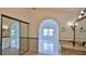 Bathroom with granite counters, tile floors, and large windows at 111 Brown Crane Ct, Daytona Beach, FL 32119