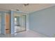 Bright bedroom featuring a ceiling fan, tile floors, and sliding mirrored closet doors at 111 Brown Crane Ct, Daytona Beach, FL 32119