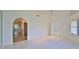 Bright and airy bedroom featuring vaulted ceilings, and access to the bathroom at 111 Brown Crane Ct, Daytona Beach, FL 32119