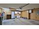 Attached garage with cabinets and shelving providing ample storage space at 111 Brown Crane Ct, Daytona Beach, FL 32119