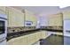 Well-equipped kitchen with sleek granite countertops and decorative tile backsplash at 111 Brown Crane Ct, Daytona Beach, FL 32119