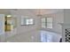 Bright living room with fireplace, chandelier, and seamless flow to the kitchen at 111 Brown Crane Ct, Daytona Beach, FL 32119