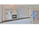 Light filled living space with fireplace and views to other rooms at 111 Brown Crane Ct, Daytona Beach, FL 32119