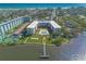 Expansive aerial view of the condo complex, highlighting its pool, tennis courts, waterfront access, and ocean views at 1224 S Peninsula Dr # 210, Daytona Beach, FL 32118