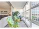 Relaxing balcony with comfortable seating and view of the outdoors, enhancing the living space at 1224 S Peninsula Dr # 210, Daytona Beach, FL 32118