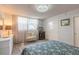 Charming bedroom featuring stylish decor, natural light, and comfortable furnishings for a peaceful retreat at 1224 S Peninsula Dr # 210, Daytona Beach, FL 32118