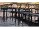 Scenic view of the bridge over the water from a rustic wooden dock at 1224 S Peninsula Dr # 210, Daytona Beach, FL 32118