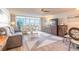 Comfortable living room with a stunning view of the water and bridge, featuring stylish furnishings at 1224 S Peninsula Dr # 210, Daytona Beach, FL 32118