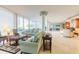 Inviting lobby with comfortable seating, floor-to-ceiling windows, and elegant furnishings at 1224 S Peninsula Dr # 210, Daytona Beach, FL 32118