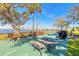 Outdoor recreation area with picnic tables, chairs, lounge chairs and water views at 1224 S Peninsula Dr # 210, Daytona Beach, FL 32118