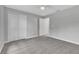 Bedroom featuring neutral carpet, fresh paint, a ceiling fan and closet at 1329 N Old Mill Dr, Deltona, FL 32725