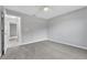 Clean bedroom featuring fresh paint, neutral carpet, and a ceiling fan at 1329 N Old Mill Dr, Deltona, FL 32725