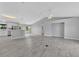 Open-concept living area with modern finishes and plenty of natural light at 1329 N Old Mill Dr, Deltona, FL 32725