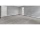Large carpeted main bedroom with ensuite bath and neutral paint colors at 1329 N Old Mill Dr, Deltona, FL 32725