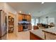 Well-equipped kitchen boasts granite countertops and stainless steel appliances with a convenient pantry at 1423 Chelsea Manor Cir, Deland, FL 32724
