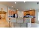 Bright kitchen with stainless steel appliances, breakfast bar, and ample cabinet space for easy meal preparation and storage at 1423 Chelsea Manor Cir, Deland, FL 32724