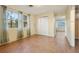 Bedroom with natural light, tile flooring, closet, and ample space for furnishings at 1493 Derbyshire Rd, Daytona Beach, FL 32117
