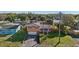 Charming multi-level home featuring an attached garage and mature landscaping, perfect for suburban living at 1493 Derbyshire Rd, Daytona Beach, FL 32117