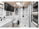Modern bathroom featuring a sleek shower, vanity, and stylish fixtures at 1572 Darlington Ave, Deltona, FL 32725