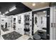 Spacious walk-in closet with ample shelving, wardrobe, and a full-length mirror at 1572 Darlington Ave, Deltona, FL 32725