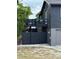 Two-story home featuring a private balcony and attached garage, blending convenience and outdoor living at 1572 Darlington Ave, Deltona, FL 32725