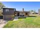 Charming two-story home with well-maintained lawn and inviting front entrance at 1572 Darlington Ave, Deltona, FL 32725