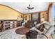 Cozy living room with comfortable seating, natural light, and views of the staircase at 1572 Darlington Ave, Deltona, FL 32725