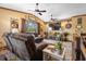 Bright and spacious living room with large windows and comfortable seating at 1572 Darlington Ave, Deltona, FL 32725