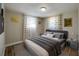 Comfortable bedroom featuring a plush bed, side tables, and soft natural light at 1609 Raleigh Ave, Daytona Beach, FL 32117