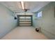 Spacious garage offering ample parking and storage space, featuring an automatic door at 1609 Raleigh Ave, Daytona Beach, FL 32117