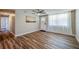 Open living room featuring hardwood floors, with a bright entry way, and ample natural light at 1609 Raleigh Ave, Daytona Beach, FL 32117