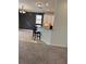 Open floorplan featuring a snack bar, kitchen, and dining area at 1812 Leather Fern Dr, Ocoee, FL 34761