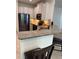 Modern kitchen featuring stainless steel appliances, granite countertops, and white cabinets at 1812 Leather Fern Dr, Ocoee, FL 34761