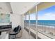 Balcony with ocean views, glass sliding doors, and tile flooring at 1900 N Atlantic Ave # 504, Daytona Beach, FL 32118