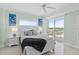 Inviting bedroom with a balcony, offering serene views and calming colors at 1900 N Atlantic Ave # 504, Daytona Beach, FL 32118