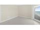 Bright room with a door leading outside at 1900 N Atlantic Ave # 504, Daytona Beach, FL 32118