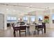 Dining room showing access to the living room, kitchen, and balcony at 1900 N Atlantic Ave # 504, Daytona Beach, FL 32118