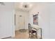 Inviting foyer with tiled flooring, decorative lighting, and an artistic accent table near the entry door at 1900 N Atlantic Ave # 504, Daytona Beach, FL 32118