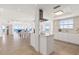 Open concept with a kitchen island and ocean views from the dining and living areas at 1900 N Atlantic Ave # 504, Daytona Beach, FL 32118