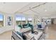 Living room with an ocean view, open layout, modern decor, and lots of natural light at 1900 N Atlantic Ave # 504, Daytona Beach, FL 32118