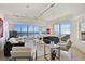 Bright living room features tile floors, modern furniture, and amazing ocean views at 1900 N Atlantic Ave # 504, Daytona Beach, FL 32118