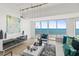 Bright living room with ocean view, modern decor, stylish furniture, and contemporary lighting fixtures at 1900 N Atlantic Ave # 504, Daytona Beach, FL 32118
