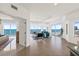 Bright living room featuring large glass windows and a beautiful ocean view at 1900 N Atlantic Ave # 504, Daytona Beach, FL 32118