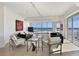 Open living room filled with bright light, floor to ceiling windows, and ocean view at 1900 N Atlantic Ave # 504, Daytona Beach, FL 32118