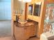 Vanity with marble counter, glass bowl sinks, glass blocks and tile floor at 1990 Spruce Creek N Cir, Port Orange, FL 32128