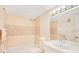 Cozy bathroom featuring a shower over the tub and single sink vanity at 200 Saint Andrews Blvd # 2804, Winter Park, FL 32792