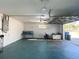 Bright and spacious garage offering ample storage, with an updated garage door opener at 2044 7Th Ave, Deland, FL 32724